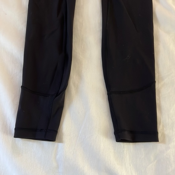 Black lululemon leggings with seems on the sides - Picture 2 of 4